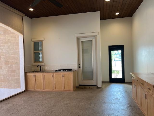201 Grand Oaks Ln, Georgetown, TX 78628 - kitchen featuring wood ceiling, recessed lighting, a sink, light countertops, and gas stovetop
