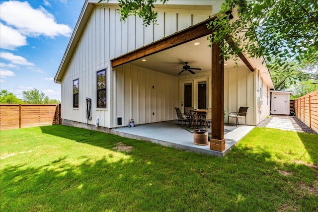 638 Oak Ln, Cottonwood Shores, TX 78657 - back of house with board and batten siding, ceiling fan, and a patio