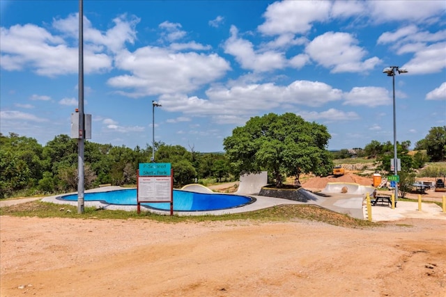 638 Oak Ln, Cottonwood Shores, TX 78657 - view of property's community featuring a swimming pool