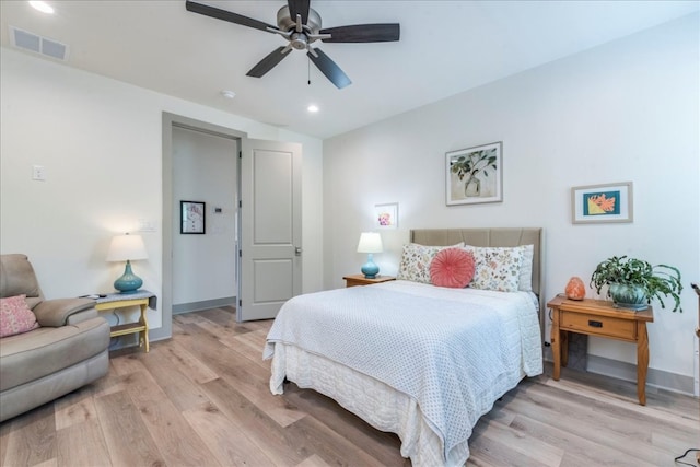 638 Oak Ln, Cottonwood Shores, TX 78657 - bedroom with light wood-type flooring, recessed lighting, ceiling fan, and baseboards
