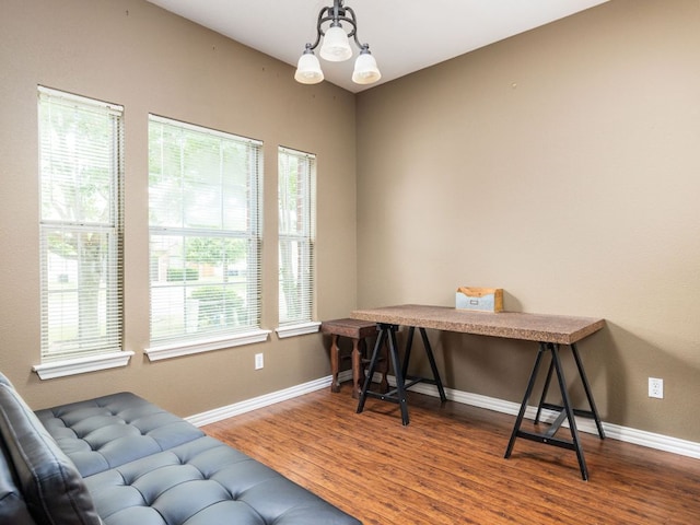 116 Brown St, Hutto, TX 78634 - office space with wood finished floors, healthy amount of natural light, and baseboards