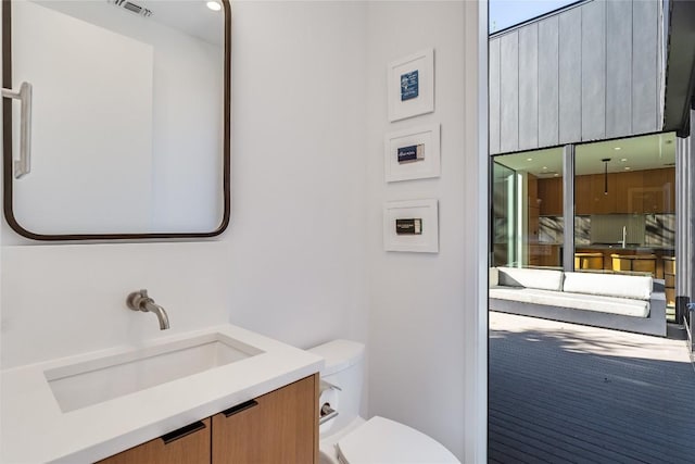 811 W James St Unit 1, Austin, TX 78704 - bathroom featuring toilet and vanity