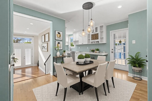 1308 N 13th St, Temple, TX 76501 - dining space with recessed lighting, light wood-type flooring, a wealth of natural light, and baseboards