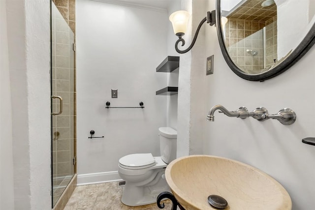 1308 N 13th St, Temple, TX 76501 - full bath featuring baseboards, a shower stall, and toilet