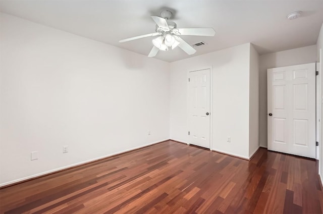 6609 Valleyside Rd, Austin, TX 78731 - unfurnished bedroom featuring dark wood-style floors and ceiling fan