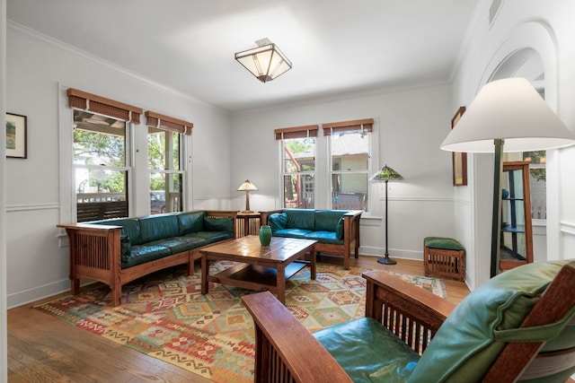 4103 Ave F, Austin, TX 78751 - living room with wood finished floors, ornamental molding, and baseboards
