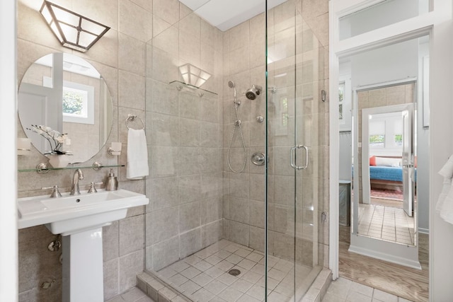 4103 Ave F, Austin, TX 78751 - ensuite bathroom with a shower stall and tile patterned flooring