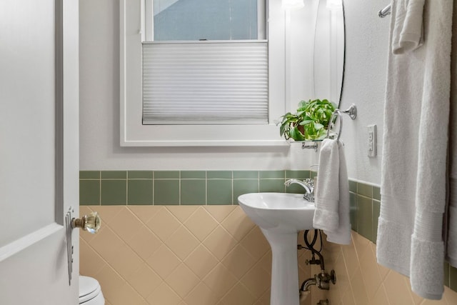 4103 Ave F, Austin, TX 78751 - bathroom featuring tile walls and toilet