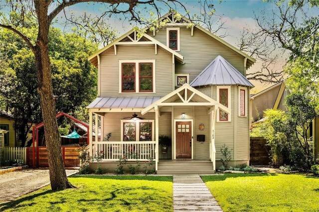 4103 Ave F, Austin, TX 78751 - view of front of property featuring a porch, metal roof, a standing seam roof, and ceiling fan