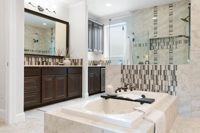 2304 High Lonesome, Leander, TX 78641 - full bath featuring crown molding, a shower stall, a jetted tub, vanity, and wine cooler