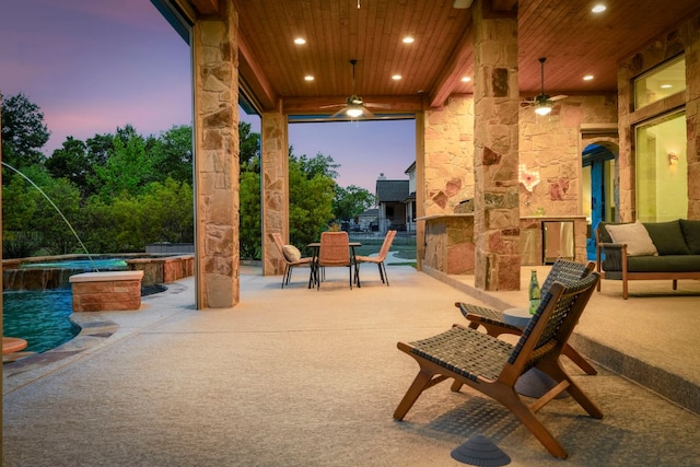 2304 High Lonesome, Leander, TX 78641 - view of patio / terrace with an outdoor stone fireplace, a ceiling fan, outdoor dining space, and a pool with connected hot tub