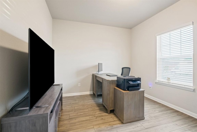 10310 Mager Ln, Hutto, TX 78634 - office area featuring light wood-type flooring and baseboards