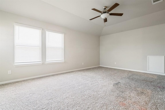 10310 Mager Ln, Hutto, TX 78634 - carpeted empty room featuring ceiling fan, baseboards, and lofted ceiling