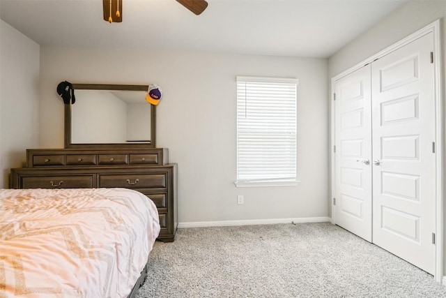 10310 Mager Ln, Hutto, TX 78634 - bedroom featuring carpet, baseboards, a ceiling fan, and a closet
