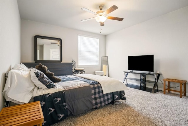10310 Mager Ln, Hutto, TX 78634 - bedroom with carpet flooring, a ceiling fan, and baseboards