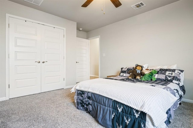 10310 Mager Ln, Hutto, TX 78634 - carpeted bedroom with baseboards, a closet, and a ceiling fan