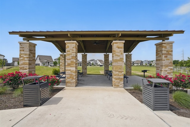 10310 Mager Ln, Hutto, TX 78634 - surrounding community with a gazebo, a yard, and a patio