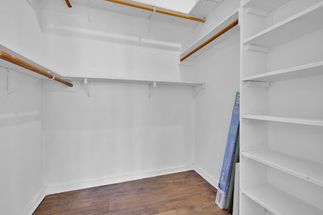 spacious closet with wood finished floors
