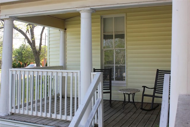 wooden terrace featuring a porch