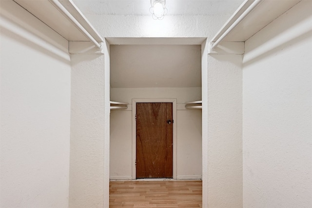 2500 Burleson Rd Unit 311, Austin, TX 78741 - spacious closet with wood finished floors