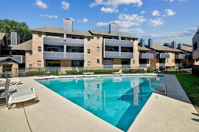 2500 Burleson Rd Unit 311, Austin, TX 78741 - community pool with a patio area