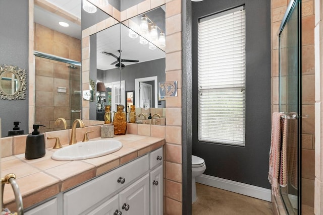 10921 Long Branch Dr, Austin, TX 78736 - full bath with a shower stall, vanity, toilet, baseboards, and finished concrete flooring