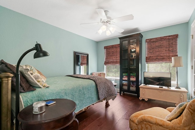 bedroom featuring wood finished floors and ceiling fan