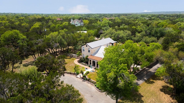 bird's eye view featuring a view of trees