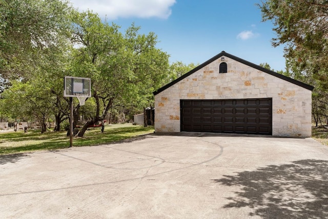 exterior space featuring stone siding and a front yard
