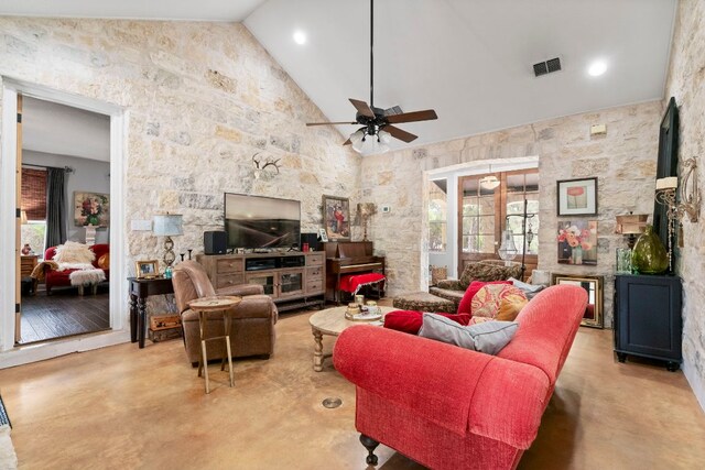 10921 Long Branch Dr, Austin, TX 78736 - living room featuring finished concrete flooring, healthy amount of natural light, ceiling fan, and high vaulted ceiling