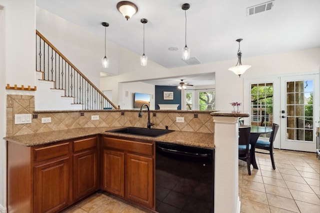 3614 Turkey Path Bnd, Cedar Park, TX 78613 - kitchen featuring dishwasher, decorative backsplash, decorative light fixtures, and light tile patterned floors