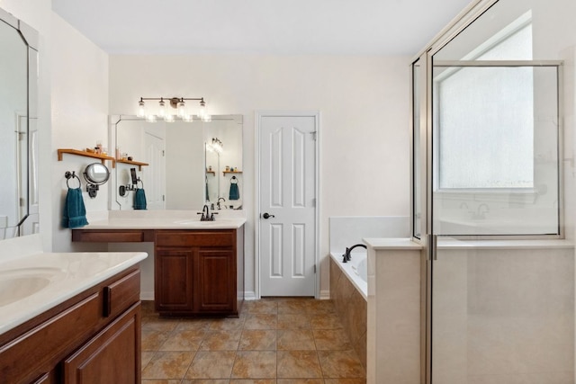 3614 Turkey Path Bnd, Cedar Park, TX 78613 - full bathroom featuring two vanities, a stall shower, and a garden tub