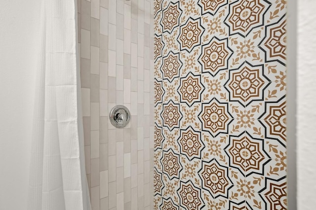 bathroom with curtained shower