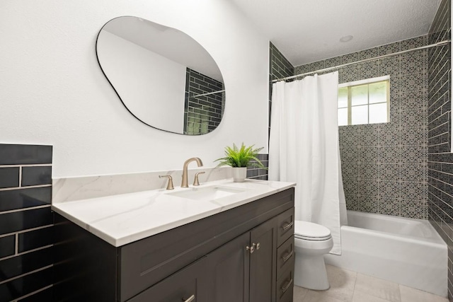 full bathroom with shower / bath combo, toilet, vanity, and tile patterned floors