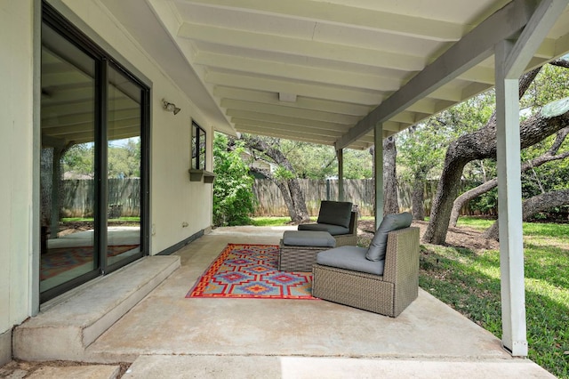 view of patio / terrace with fence