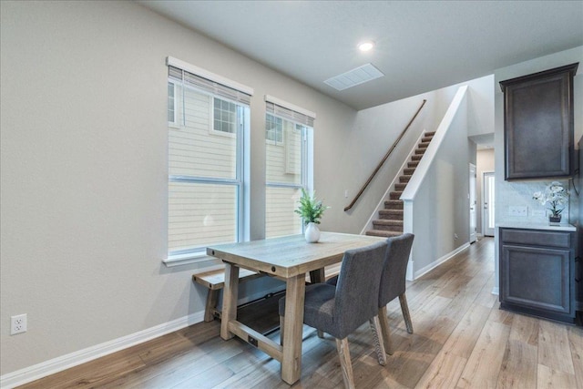 943 Lone Peak Way, Dripping Springs, TX 78620 - dining area featuring baseboards, light wood-type flooring, stairs, and recessed lighting