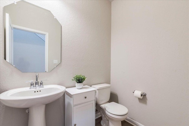 943 Lone Peak Way, Dripping Springs, TX 78620 - bathroom with toilet and a textured wall