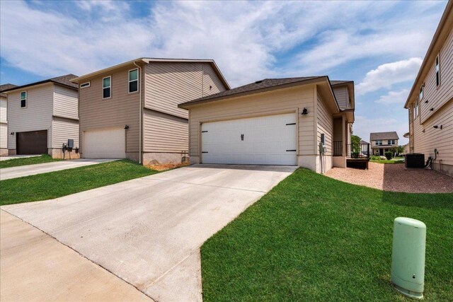 943 Lone Peak Way, Dripping Springs, TX 78620 - view of front of house with driveway and a front yard