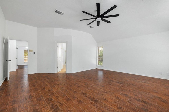 unfurnished living room featuring wood finished floors, a ceiling fan, visible vents, and lofted ceiling