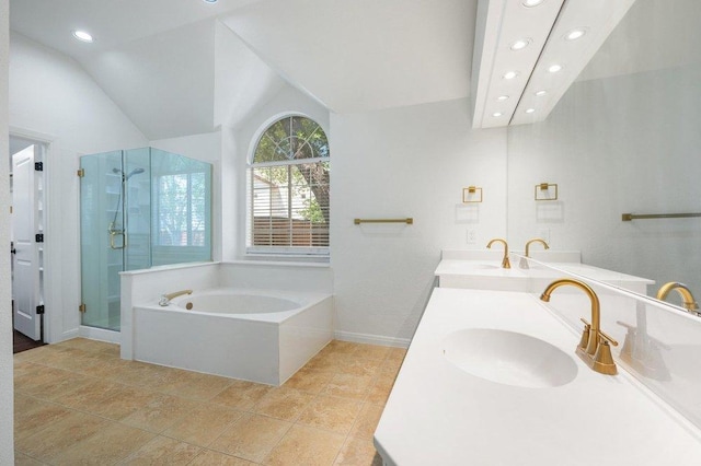 209 El Rio Dr, Lakeway, TX 78734 - bathroom featuring recessed lighting, a garden tub, a stall shower, double vanity, and lofted ceiling