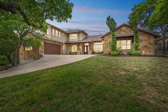 1113 Lions Lair, Leander, TX 78641 - view of front of home with stone siding, driveway, and stucco siding