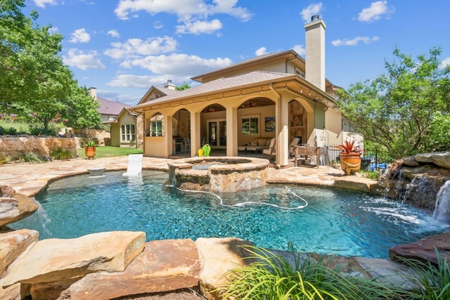 1113 Lions Lair, Leander, TX 78641 - view of swimming pool with a patio and a pool with connected hot tub
