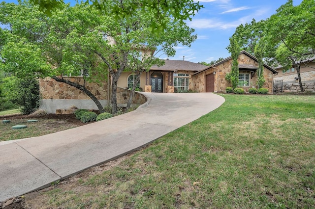1113 Lions Lair, Leander, TX 78641 - single story home with stone siding, driveway, a garage, a front yard, and french doors