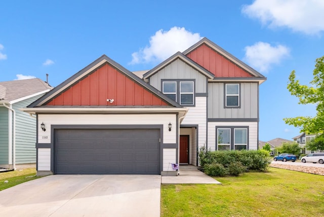 craftsman house featuring board and batten siding, an attached garage, driveway, and a front lawn