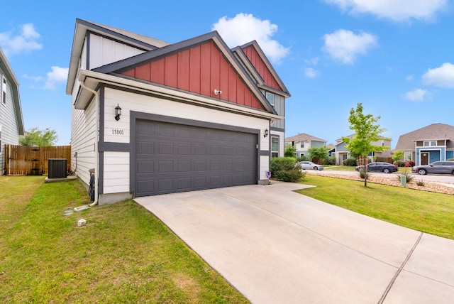 view of property exterior featuring driveway, fence, a garage, board and batten siding, and a yard