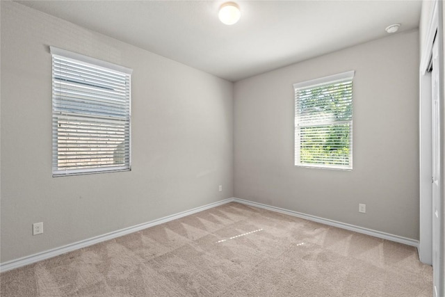 8060 Massa Dr, Round Rock, TX 78665 - empty room featuring light colored carpet and a smoke detector
