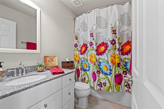 8060 Massa Dr, Round Rock, TX 78665 - bathroom with vanity, tile patterned floors, a textured wall, and shower / bath combo with shower curtain