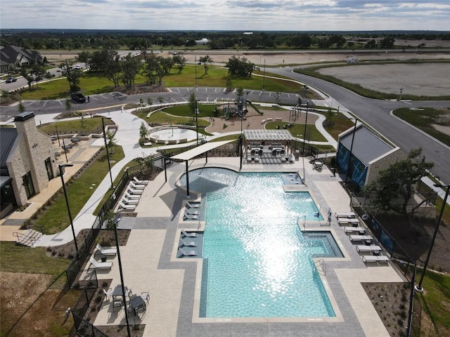 community pool featuring a patio