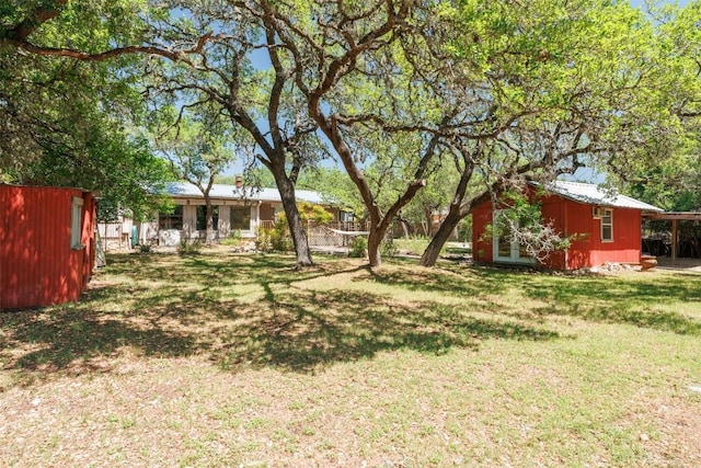 409 Hub Dr, Wimberley, TX 78676 - view of green lawn with an outdoor structure