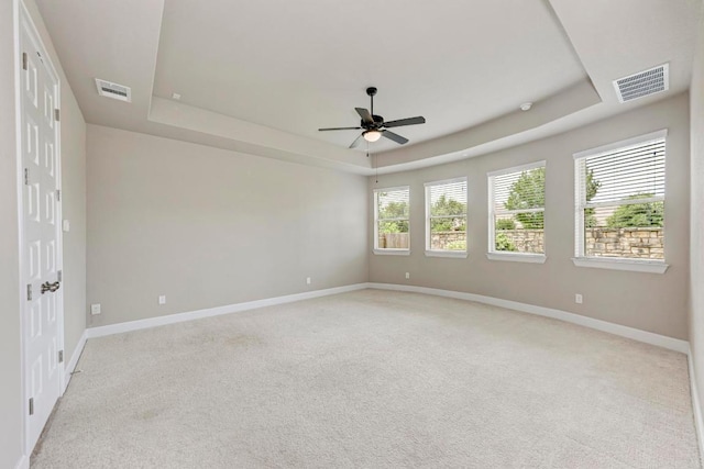 4228 Hannover Way, Round Rock, TX 78681 - unfurnished room featuring a raised ceiling, ceiling fan, and light carpet